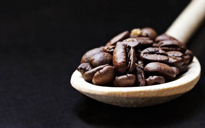 Coffee Beans In A Wooden Spoon