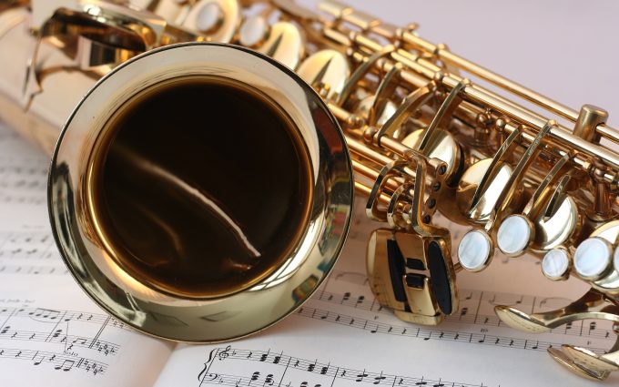 Saxophone Placed On A Sheet Music