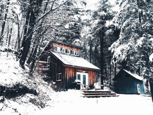 Snowy house in a forest HD