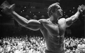 Arnold Schwarzenegger posing in Mr. Olympia (B&W) HD
