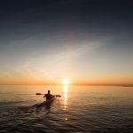 Kayaking During A Sunset