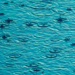 Rain On Blue Water