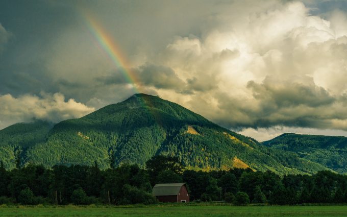 Rainbow On A Green Mountain