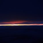 Sunset Above The Clouds