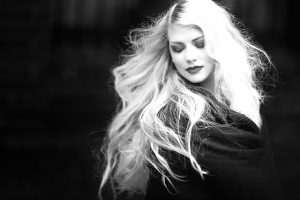 Gorgeous woman with blonde hair black and white 4k