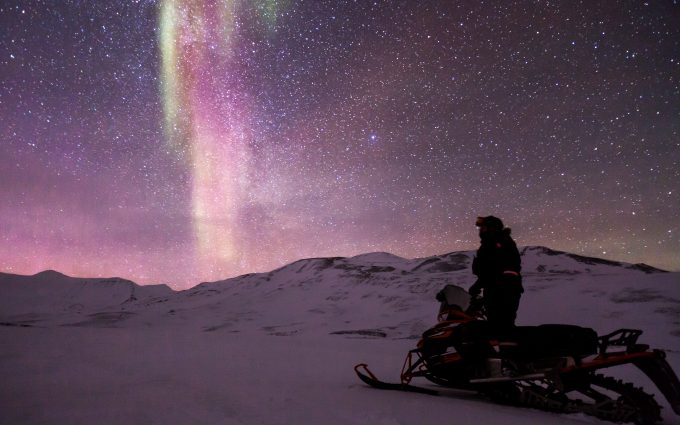 Contemplation Of An Aurora Borealis And The Milky Way On Snowmobile 5K