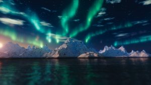 Northern Lights Over Snowy Mountains HD