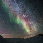 Starry Sky With Aurora Borealis Over Snowy Mountains 5K