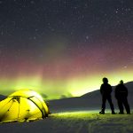 Two Humans Watching An Aurora Borealis And The Milky Way 5K
